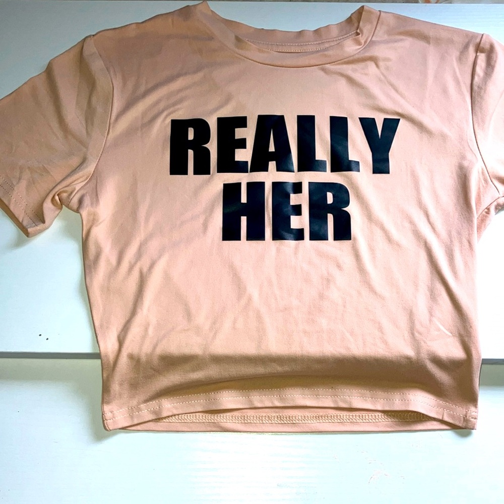 Beige,Really Her shirt in all black caps for petite girls/women.